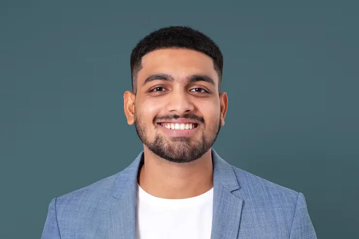 cheerful businessman smiling closeup portrait jobs career campaign_53876 129416